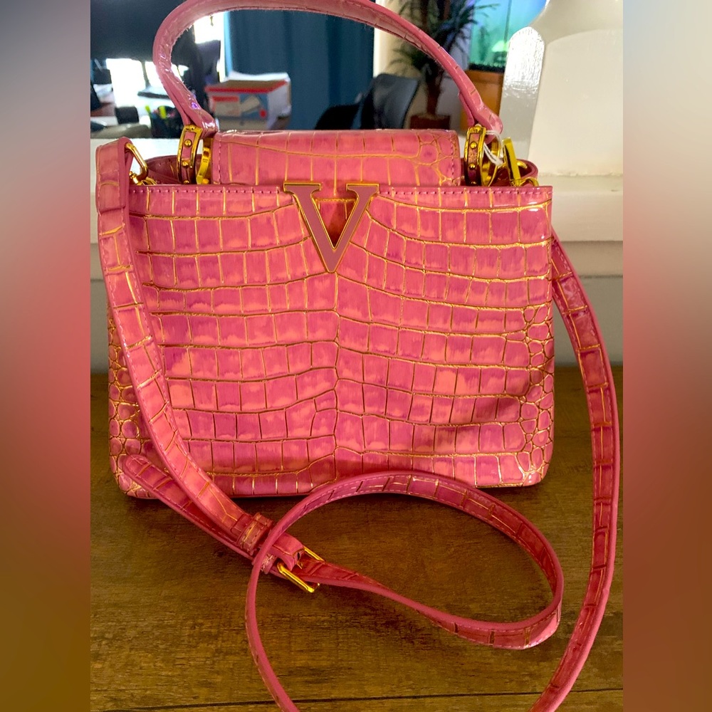Pink and gold shoulder bag.